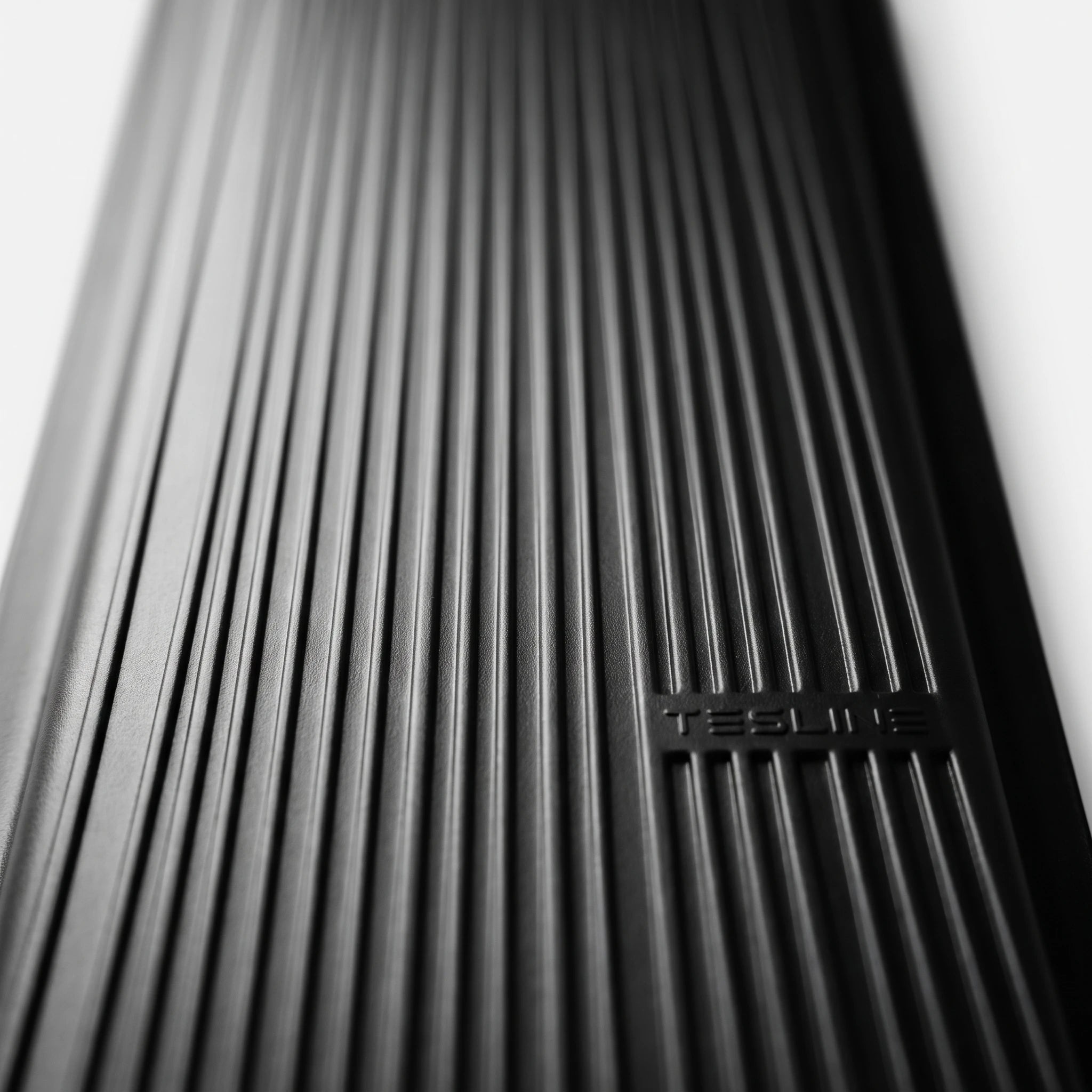 Texture striée du cache Tesline assortie aux finitions Tesla