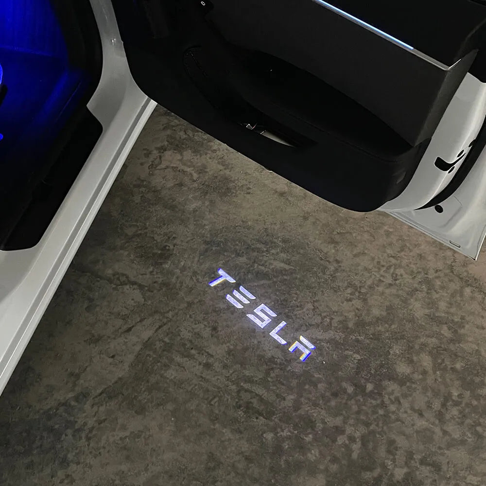 Projecteurs de logo au sol Tesla — visuel 1