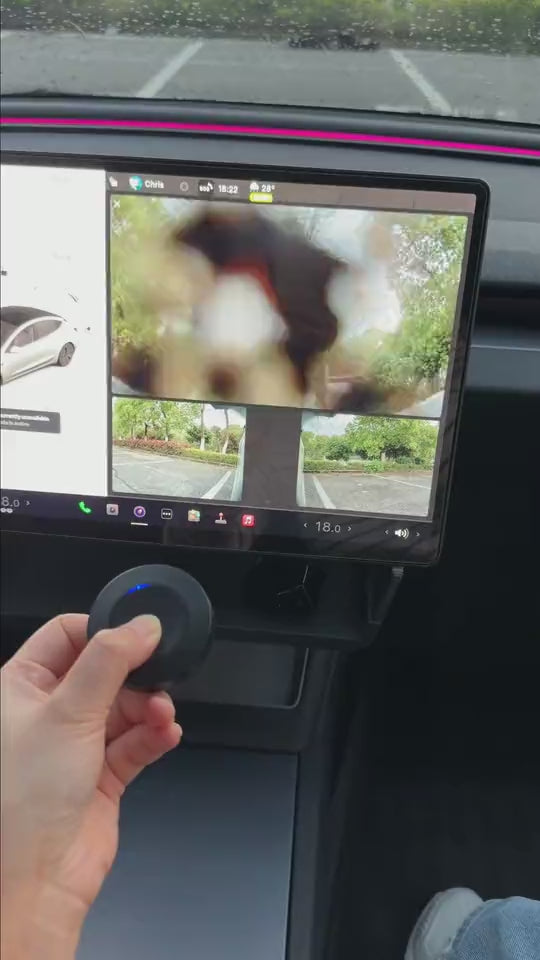 Un bouton dans l'habitacle nettoie la caméra de recul.
