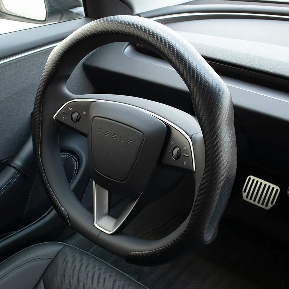 Couvre-volant effet carbone Tesla — visuel 1