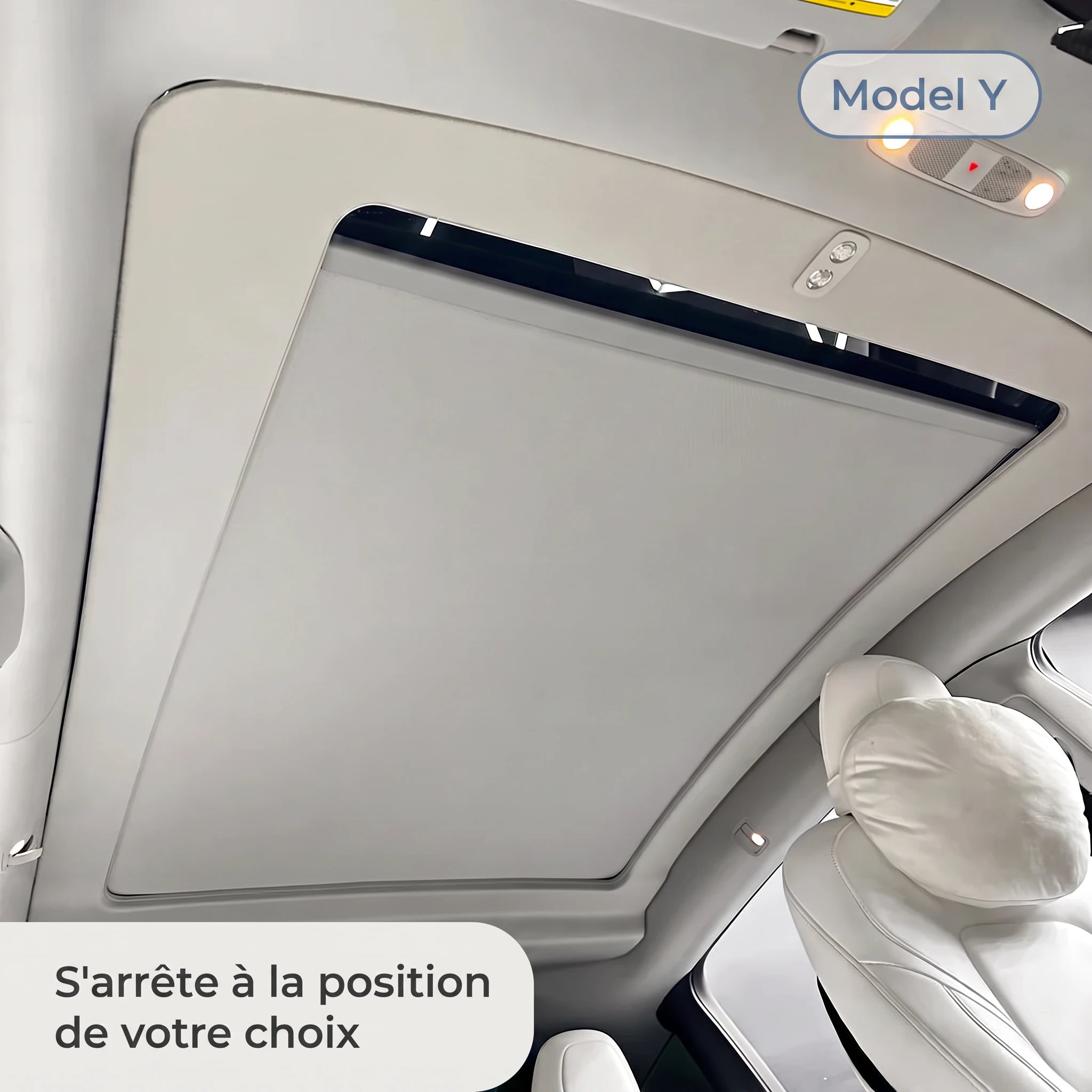 Pare-soleil électrique arrêté à mi-course sur toit panoramique — Tesla Model Y