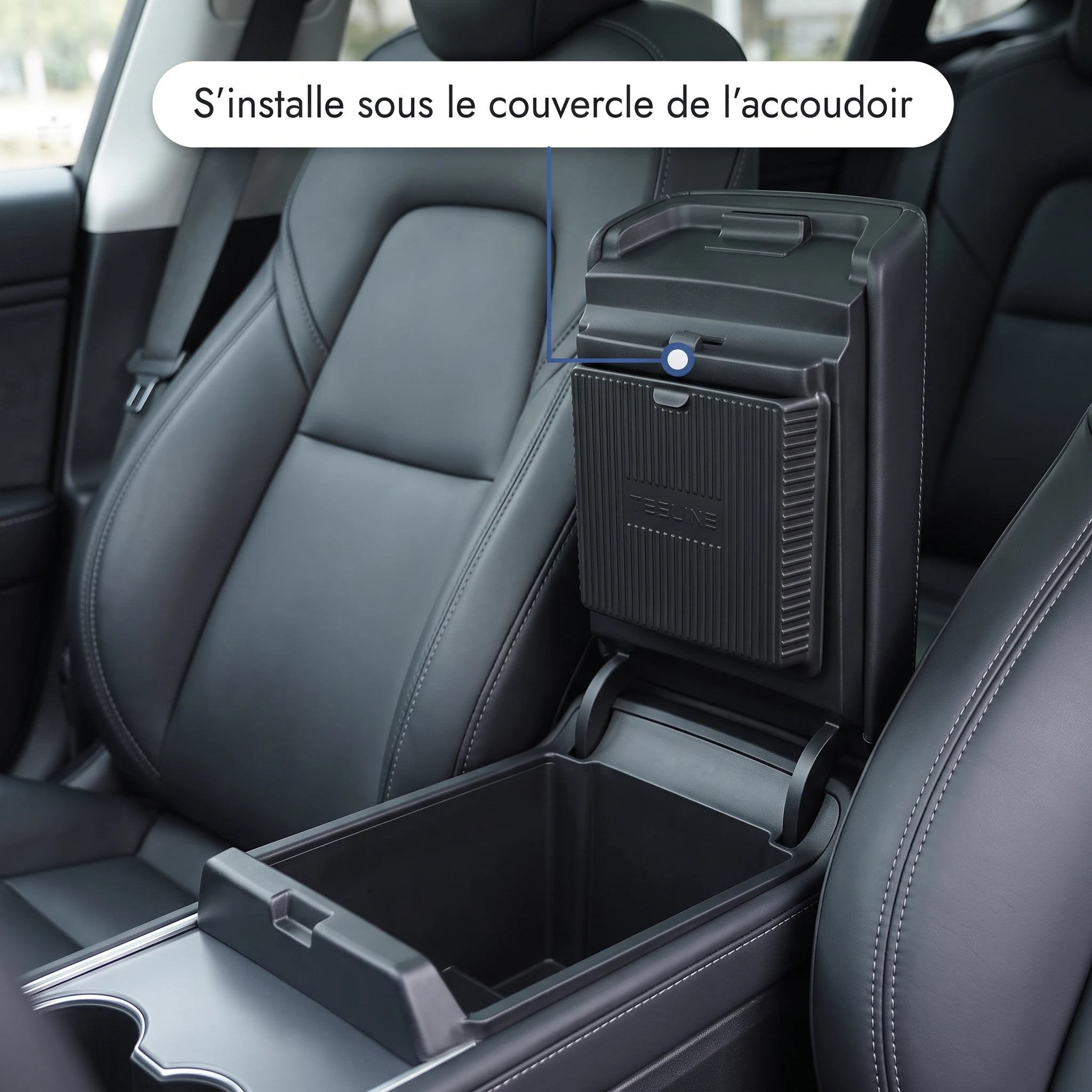 Emplacement du rangement invisible sous le couvercle de l'accoudoir central Tesla